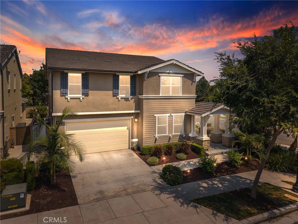 Located in the heart of the master-planned New Haven community in Ontario Ranch, this beautifully maintained move-in ready home offers the perfect balance of comfort, style, and functionality. From the moment you enter, you're welcomed by a spacious and open layout that flows effortlessly, featuring upgraded finishes, abundant natural light, and a modern neutral palette throughout. The main level includes a bedroom and full bath—ideal for guests or a private office—as well as a gourmet kitchen with granite countertops, stainless steel appliances, a large island, and a walk-in pantry, making it a dream for both cooking and entertaining. Upstairs, a generous loft and bonus flex space provide the perfect setting for a kids’ playroom, homework station, or home office. The primary suite boasts dual walk-in closets, a soaking tub, and a separate shower for a true retreat experience.
Step outside to a well-sized backyard oasis complete with artificial turf, a covered gazebo, and ample space for gatherings, pets, or simply relaxing outdoors—all with the benefit of low maintenance. The home also includes a 3-car tandem garage, upgraded lighting, smart home features, and energy-efficient systems for added value. As a resident of New Haven, you’ll enjoy access to five community parks and pools, as well as pickleball courts, playgrounds, a dog park, and regular neighborhood events that foster a vibrant and connected lifestyle. With its resort-style amenities, top-rated schools nearby, and convenient proximity to shopping, dining, and major freeways, this home is more than just a place to live—it’s a lifestyle upgrade waiting for you.
