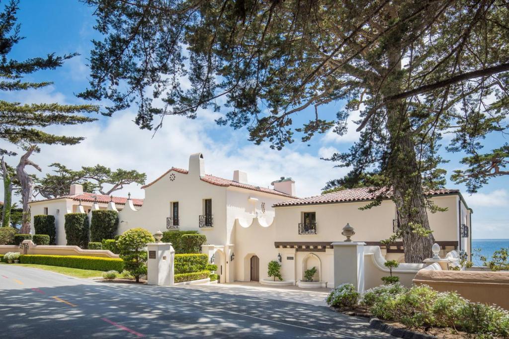 Described in 1925 as "A Spanish Palace by the Sea," Villa Eden Del Mar has long been considered one of the most renowned homes on the Monterey Coast and a treasured landmark in Pebble Beach. The majestic courtyard entry leads to a sumptuous living room with unparalleled views of the Pacific, beyond which is the Terrace Room, surrounded by floor-to-ceiling windows with breathtaking 180-degree views of the Pacific and rugged coastline. The rich, meticulous craftsmanship throughout features custom laid marble-tiled floors, high, carved wooden ceilings, and massive stucco walls within which the likes of artists, celebrities, business tycoons and international royalty have been entertained. This impressive 2.8-acre oceanfront compound includes four structures: the main house, a masterpiece to behold, with 15,418 sq ft of living area; an oceanfront Lyceum with 3,651 sq ft; a 2BR/2BA penthouse guest apartment with 1,806 sq ft; and a separate 2BR/1BA caretaker's cottage with 976 sq ft.