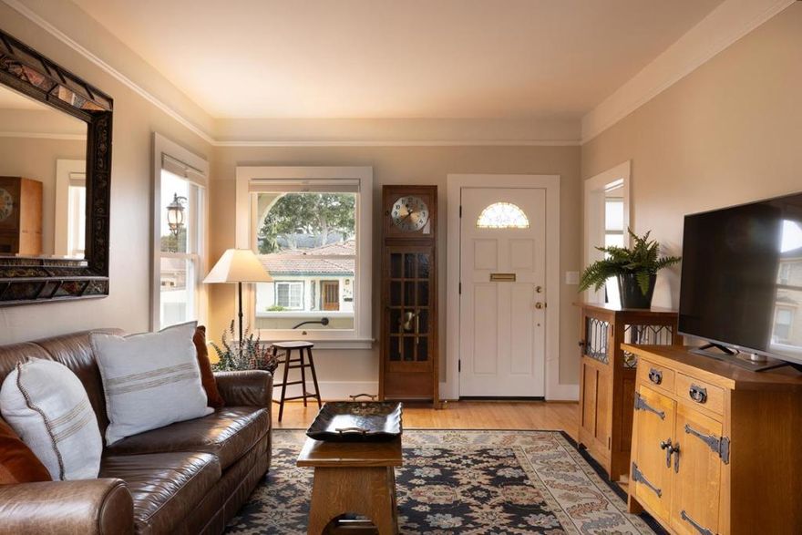 This delightful cottage built in 1906 is located in historic Pacific Grove, easy walking distance to downtown. This 2BR/1BA gem combines timeless character with luxurious modern upgrades. The remodeled kitchen boasts granite counters, Viking range, and Miele dishwasher, while the spa-style bath offers a Toto washlet, WiFi-controlled heated floors, heated towel rack, Hansgrohe fixtures, and smart mirror. Living areas feature an Arhaus chandelier with dimmer, Hunter Douglas window treatments, Nest smart thermostat, and gas floor heater. Italian ship stairs lead to a finished attic with two twin beds and skylights. Outdoor living shines with a sunny deck, bay view from bedroom window, outdoor shower, and flower box. A detached casita includes a laundry sink, wall heater, washer/dryer, plus approved plans for shower, toilet, and sauna. The attached 1-car garage offers storage, Tesla EV charger, and tankless water heater. Original five-panel doors, abundant natural light, and an easy walk to PG including; shops, restaurants, bookstores and coastal trail. Excellent PG schools complete this rare blend of history and modern comfort.