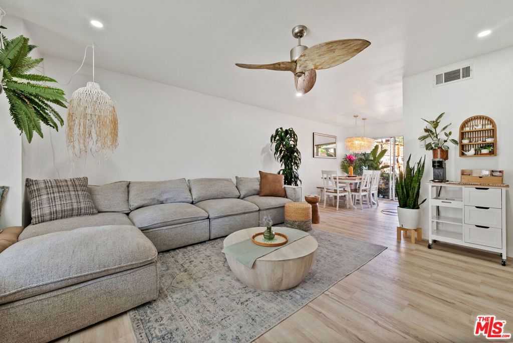 Step into coastal serenity with this beautifully renovated 3-bedroom, 1.5-bath townhome nestled on a quiet cul-de-sac in East Ventura's highly desirable Todd Ranch community. With thoughtful upgrades throughout and an inviting coastal aesthetic, 1406 Chipmunk Circle feels like a personal retreat designed for comfort, style, and easy living. This home was meticulously remodeled as a primary residence, not a flip, meaning every detail was chosen with long-term quality and daily enjoyment in mind. The entire interior has been fully updated, featuring durable and stylish LVP (luxury vinyl plank) flooring throughout, elegant sheen tiles in the kitchen and bathrooms, and Capiz shell-inspired accents that reflect natural light to create an airy, tranquil atmosphere. Dimmable recessed lighting allows you to customize the ambiance throughout the home. Additional modern upgrades include Bluetooth-enabled bathroom fans, bedroom closets, LED guide night lights in the hallways and common areas, and a newly finished epoxy garage floor. Outside, a private redwood deck with built-in bench offers a peaceful space to relax, garden, or entertain. The spacious, light-filled living area flows seamlessly into your private backyard oasis ideal for enjoying Ventura's year-round mild climate. Whether you're hosting guests or unwinding at the end of the day, this home is designed to make every moment feel special. Located in the pet-friendly Todd Ranch community, residents enjoy access to multiple swimming pools, clubhouses, and expansive greenbelts with walking paths, perfect for morning strolls or evening walks with your furry companion. The location also offers easy access to the Ventura Government Center, Ventura Aquatic Center, shopping, dining, and the 101 and 126 freeways, while being just a short drive to Ventura's beaches, harbor, and vibrant downtown. With low HOA dues and a high-quality, move-in-ready interior, this home offers exceptional value in one of Ventura's most welcoming and well-connected neighborhoods.