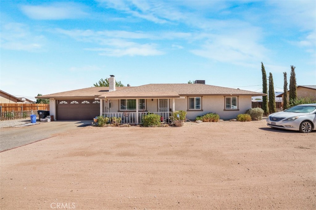 ** 4 BEDS / 3 BATHROOMS *** GARAGE CONVERETED ADU *** Beautiful single-story home on a spacious lot in desirable Apple Valley! This updated property features 3 bedrooms and 2 baths plus a garage conversion with its own kitchen and full bathroom — perfect for extended family or potential rental income. Enjoy a bright open layout, cozy fireplace, and large fenced yard with a covered patio for relaxing or entertaining. Plenty of space for RV parking or future additions. Conveniently located near schools, shopping, and commuter routes. Move-in ready and full of potential!