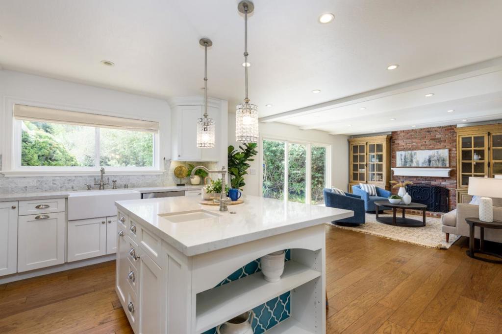 Welcome to this beautifully updated 4-bedroom, 2-bathroom home situated on a generously sized lot. Offering a perfect blend of comfort, style, and convenience, this residence features a spacious primary suite complete with dual closets and a stall shower. Enjoy entertaining in the large living room with a cozy gas-starter fireplace, or host elegant dinners in the formal dining room. The stunning kitchen is a chefs dream, showcasing sleek quartz countertops, stainless steel appliances, and a large center island, all flowing seamlessly into a convenient breakfast nook and expansive family roomideal for everyday living and gatherings. Located within the highly regarded Burlingame school district and just minutes from top-rated restaurants, shopping, and transportation, this home presents an exceptional opportunity to enjoy the very best of Peninsula living.
