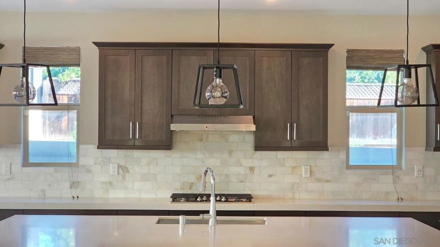 Beautiful 5-Bedroom Home on Private Cul-de-Sac, located in the desirable community of Canopy Grove. Built in 2021, this highly upgraded, Light and bright, 5-bedroom, 3.5-bath home with 3,209 sq ft of open living space, is nestled on a premium lot at the end of a quiet cul-de-sac. The spacious floor plan features a large kitchen island  with a breakfast bar, stainless steel appliances, and an abundance of natural light throughout. The open-concept layout features a downstairs bedroom and attached full bath,  making it ideal for guests or a home office. Upstairs offers a generous loft, perfect for a second living area, along with a spacious primary suite featuring a walk-in closet and spa-like en-suite bath.  Enjoy a beautifully landscaped outdoor space with a covered patio, ideal for entertaining or relaxing. Owned Solar panels provide energy efficiency.  Don't miss out on this gorgeous, move-in-ready home. Canopy Grove offers beautiful amenities, including miles of walking trails, a pool, spa, clubhouse,  multiple parks, dog park, volleyball, pickleball, and more.