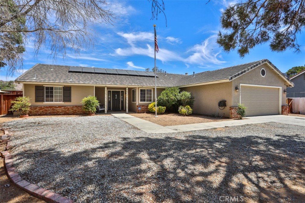 Welcome to 16403 Cuyama Way, a home where comfort, care, and the best of the High Desert lifestyle come together. Tucked away at the end of a peaceful cul-de-sac in the sought-after Sycamore Rocks community of Apple Valley, this home isn’t just a place to live—it’s a place to belong.
Step inside and immediately feel the warmth of a thoughtfully designed SINGLE - STORY layout with 3 bedrooms, 2 bathrooms, and over 2,000 sq. ft. of living space. The open-concept floor plan flows easily from the living room to the dining area and into a spacious kitchen with island and breakfast nook—the perfect setting for family dinners, morning coffee, or evenings spent with friends. A separate family room with a cozy fireplace invites laughter, movie nights, and memories made year-round.
This home has been lovingly upgraded with solar panels (monthly payment is $200 and fluctuates / power purchase agreement with Sun Run) that bring energy savings and peace of mind, fresh paint inside and out, a newer septic system, and newer water heater. Custom screen doors, rock landscaping, and a hardwired security system add both beauty and comfort.
The outside space is just as inviting. A wide driveway, attached 2-car garage, and dedicated RV parking mean there’s room for every adventure. The expansive backyard—shaped perfectly for gatherings—offers space to garden, build your dream pool, or simply relax beneath the endless desert skies.
And then, there’s Apple Valley itself. Life here feels open, calm, and connected. You’ll wake up to brilliant desert sunrises and wind down with painted sunsets. Weekends mean easy trips to Big Bear, Lake Arrowhead, or local trails. Schools, shopping, and medical facilities are just minutes away, yet at home you’ll enjoy the peace of wide streets and starry skies. It’s a lifestyle that balances serenity with convenience—a lifestyle many dream about, but few get to truly live.
This isn’t just a house. It’s where your next chapter begins. Whether you’re starting out, growing into more space, or simply seeking a home that gives you both comfort and possibility, 16403 Cuyama Way is ready to welcome you. Come see for yourself—your new home is waiting and make us an offer we can not refuse!