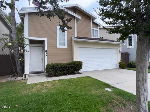 Photo of 11337 Dronfield Terrace #4, Los Angeles, CA 91331 (MLS # P1-27425)