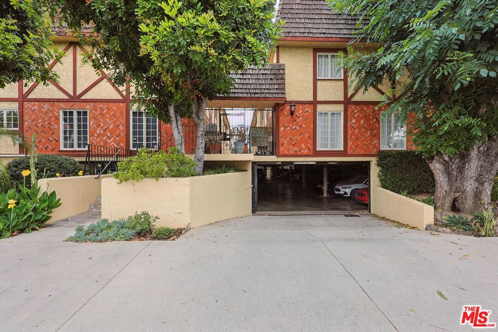 Welcome to this bright and beautifully updated two-story townhome in a quiet, gated community where there's no one above or below you, and every space feels open, private, and thoughtfully designed. From the moment you step inside, you're greeted by streams of natural light, warm tones, and a layout that's as functional as it is inviting.The main level offers a seamless open-concept living and dining area ideal for both relaxing evenings and effortless entertaining. The kitchen has been tastefully renovated with modern quartz countertops, clean-lined contemporary cabinetry, and a cozy breakfast nook that quickly becomes your favorite spot for morning coffee or catching up over a casual meal.Upstairs, you'll find two generously sized en-suite bedrooms, each with its own full bath, offering comfort and privacy for family or guests. The primary suite features soaring cathedral ceilings and dual closets, giving you extra breathing room and ample storage. An in-unit laundry area is conveniently located on the upper level, while a powder room on the main floor keeps guests comfortable without disturbing your private spaces above.Additional features include gated, tandem two-car parking located directly beneath the unit for maximum convenience, plus low HOA dues of just $275 both value and peace of mind.Perfectly situated for commuters, this home is just minutes from the 405 and 170 freeways, the Van Nuys Metrolink Station, and the shops, dining, and entertainment at NoHo West. Local parks and community amenities are also close by, adding even more to love about the location.This turnkey townhome checks every box: style, function, comfort, and location. Come see it for yourself and feel right at home.