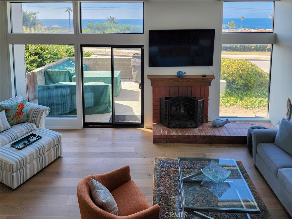 AVAILABLE FOR SHORT OR LONG TERM LEASE! 31 DAY MINIMUM. FULLY FURNISHED!
Enjoy gorgeous sunsets and breathtaking ocean views from the living space and primary suite across both floors in this this 3-bedroom, 2.5-bathroom home, just a few blocks to the beach! The open-concept living space includes a dining and living room with floor-to-ceiling windows that overlook the beautiful blue ocean, with slider access to the west deck with a propane grill and lounge seating for the ultimate SoCal indoor-outdoor living!
On cooler nights, you’ll love cozying up by the fireplace and big screen TV for family movie night. The dining room table seats six and the kitchen is fully-equipped with everything you need for creating your culinary delights! Also on this floor is a guest bathroom, and a dedicated desk space for a comfortable work environment in your beach getaway.
Upstairs you’ll find all three bedrooms, including the primary suite with more ocean views, an ensuite bathroom with a walk-in shower, and large walk-in closet. The top floor has two more bedrooms, a hall laundry, and a full hall bathroom.
Skip down to the downtown Riviera Village, full of fantastic restaurants, groceries, shops, and nightlife, and of course the sun, surf, sand and The Strand bike path and cruise miles up the coast! Come enjoy an amazing beach vacation, or longer term stay, comfortably tucked away, yet conveniently located just 10 miles from LAX and 25 miles to Downtown LA!