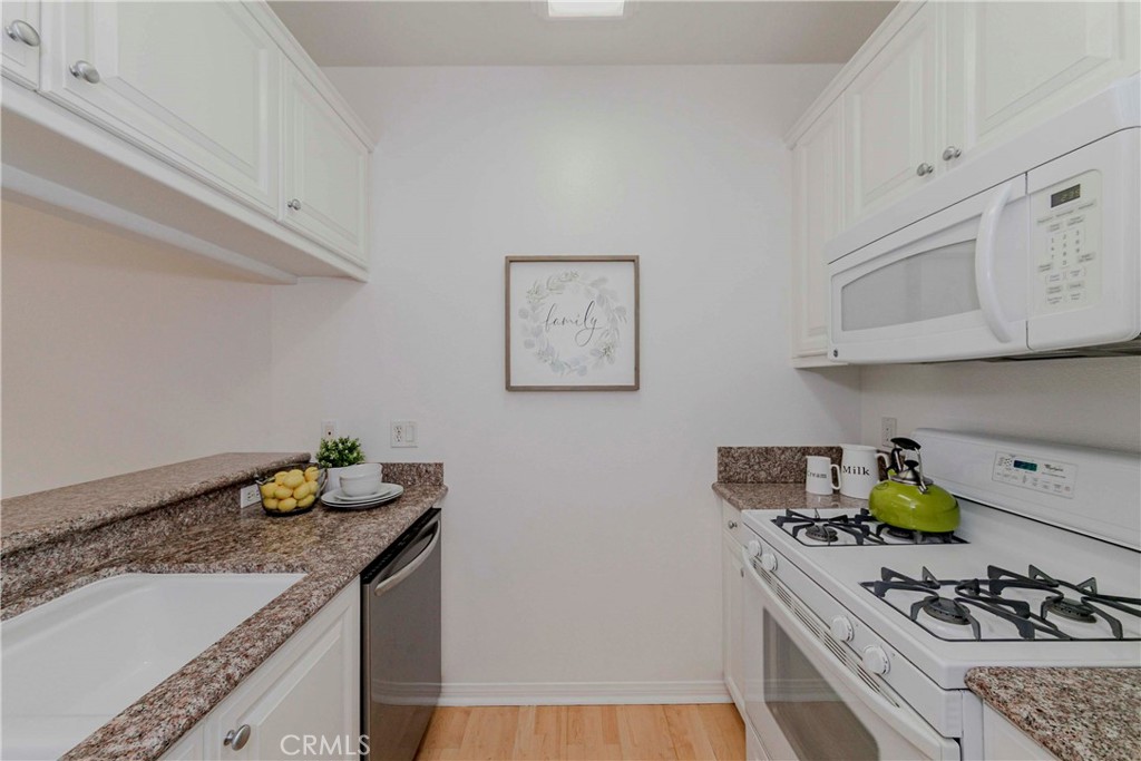 Welcome to your new home in Pacific Village, a vibrant 55+ senior community offering a serene and comfortable lifestyle. Brand new carpet and fresh paint, creating a welcoming ambiance throughout. The kitchen features a sleek granite countertop. Living room which opens up to a private patio, perfect for relaxing or entertaining guests. installed a new A/C & Heating system in the master bedroom. Tankless water heater.
Parking is a breeze with an assigned space located on the ground level (lower deck #17), upper level has ample guest parking available. HOA fee of $450, residents benefit from inclusive water and trash service. Pacific Village goes beyond just a place to live; it offers an array of amenities for residents to enjoy. Take advantage of the expansive community room equipped with a full kitchen and private bathroom, ideal for gatherings and events. Unwind in the refreshing pool or rejuvenate in the relaxing spa. For added convenience, the security building provides dual elevator access, ensuring peace of mind for all residents. Plus, complimentary laundry facilities available exclusively for residents. Conveniently located near Madrona Marsh, Denny's, shopping centers, hospitals, eateries, and Redondo Beach. Easy access to the 110 freeway. Don't miss this opportunity for comfortable seniors living in a prime location.