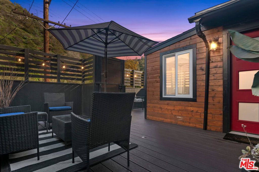 Photo of 1653 N Beverly Glen Boulevard, Los Angeles, CA 90077 (MLS # 26667739)