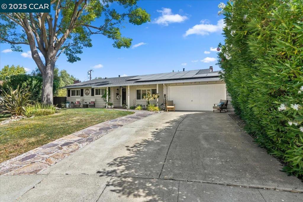 Stunning luxury 1,767 sq ft home on premium, cul-de-sac lot w/ contemporary finishes throughout. Bright & stylish floor plan w/ 3 bedrooms, 2 full bathrooms, charming front porch, beautifully updated kitchen, family & living rooms, formal dining room, hardwood flooring & backyard w/ pool, built-in BBQ & multiple entertaining areas amid mature well-maintained landscaping. Enter at foyer & into living room w/ grand windows filling the space w/ natural light. Magnificent, fully updated contemporary kitchen comes complete w/ gorgeous stone countertops, stylish craftsman finished cabinets, tiled flooring, stainless steel appliances, modern light fixtures & large windows. The kitchen overlooks the family room w/ stunning gas fireplace, wine fridge & French doors leading to back patio & spacious backyard. Primary suite w/ French doors to backyard & pool, walk-in bathroom & dual closets. Updated primary bathroom includes vanity w/ natural stone tiled countertop & custom walk-in shower. Two bedrooms are inviting w/ new windows accented w/ elegant plantation shutters & spacious closets. Roomy full bathroom comes w/ sleek stone countertops & elegant shower over tub. Backyard is spectacular, offering multiple seating areas for entertainment, grassy areas, built-in BBQ & sparkling pool.