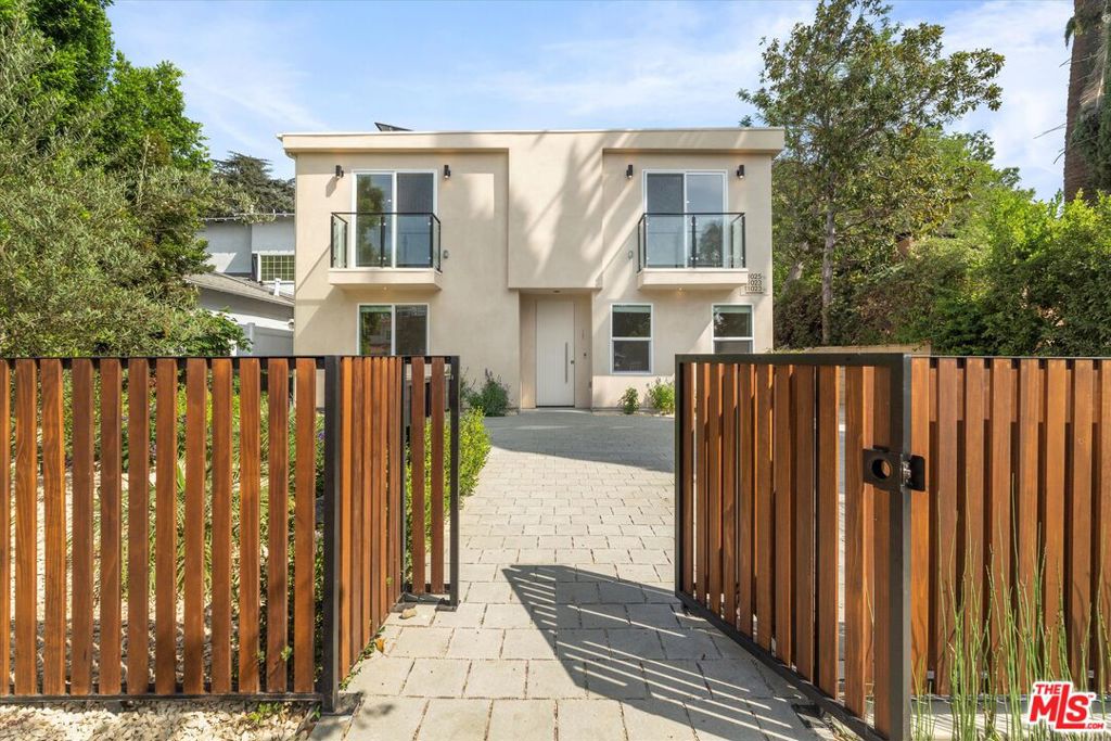 Brand-New Modern Living in the Heart of West Toluca Lake!! Be the very first to live in this newly constructed 4 bedroom, 3 bathroom home spanning approximately 1,700 square feet. Part of a newly built 4-unit complex, the home is thoughtfully designed for modern comfort and effortless living blending a contemporary style with everyday functionality in one of the Valley's most desirable neighborhoods. Inside, you'll find Samsung stainless steel appliances, custom window shades, and built-in closet systems for maximum storage and organization. The first level includes one guest bedroom and bathroom w/ an open-concept design that is enhanced by European-style cabinetry, warm wood tones, durable vinyl plank flooring, and sleek finishes throughout. The primary suite boasts a generous space, a walk-in closet, a spa-inspired bath and a balcony along with a secondary balcony off of one of the guest bedrooms. Convenience is built in, with a full-sized washer & dryer located on the second level. For added ease, this home includes two tandem parking spaces right out front, plus drought-tolerant landscaping that keeps the exterior clean and low-maintenance. Don't miss this opportunity to enjoy brand-new living where style, convenience, and comfort come together in the heart of the east Valley.