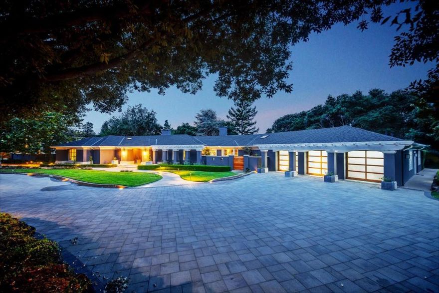 Once in a lifetime opportunity to experience perfection at this breathtaking Executive Estate in the most sought-after Los Gatos/ Saratoga Neighborhood. Just completed top to bottom renovation in 2017. Step into this high tech, sprawling oasis where luxury meets modern comfort and convenience. This 7,705 square feet single-level ranch-style Estate with basement is a breathtaking, custom-built paradise nestled on over one acre in the prestigious and highly sought-after neighborhood. Featuring two wings each complete with their own master suite, the home has a total of 7 bedrooms + Den, 6 full baths, 3 half baths, Guest House with a full kitchen, Movie Theatre with surround sound, 3,000 bottle Wine Cellar, Bocce Ball Court, Horseshoe Pit and attached three-car Garage with an electric vehicle charger - all canopied by stunning California Redwood / Pine trees on a corner lot. Upgraded with Control4 home automation controlling lighting, whole house sound, video distribution and HVAC.