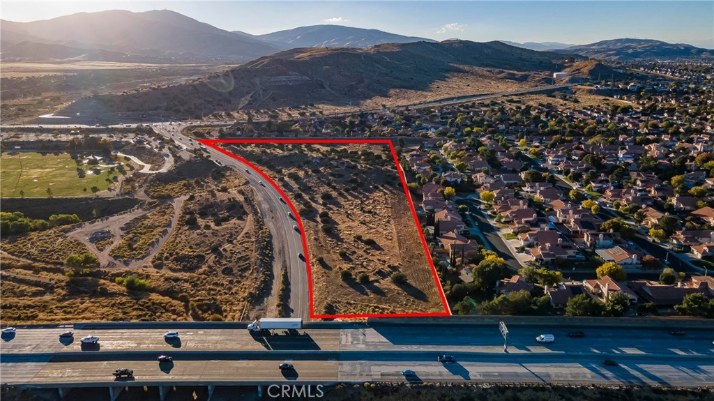 Over 10 Acres Zoned General Commercial (C-3) in the city of Palmdale. Two Separate Contiguous Parcels being sold together. Suitable for Retail, Office, Hotel, Mini-Storage, Gas Station, Car Wash and more. Buyer to confirm with the City of Palmdale. Adjacent to AV Freeway. Residential Development to the north and west. Block walls on two sides. All Utilities available. Close to Major Shopping Outlets and Community Shopping Centers, the Palmdale Business Park and the Palmdale Regional Hospital. Lots of development options. Don't miss this rare opportunity. APNs 3004-015-042 and 043.