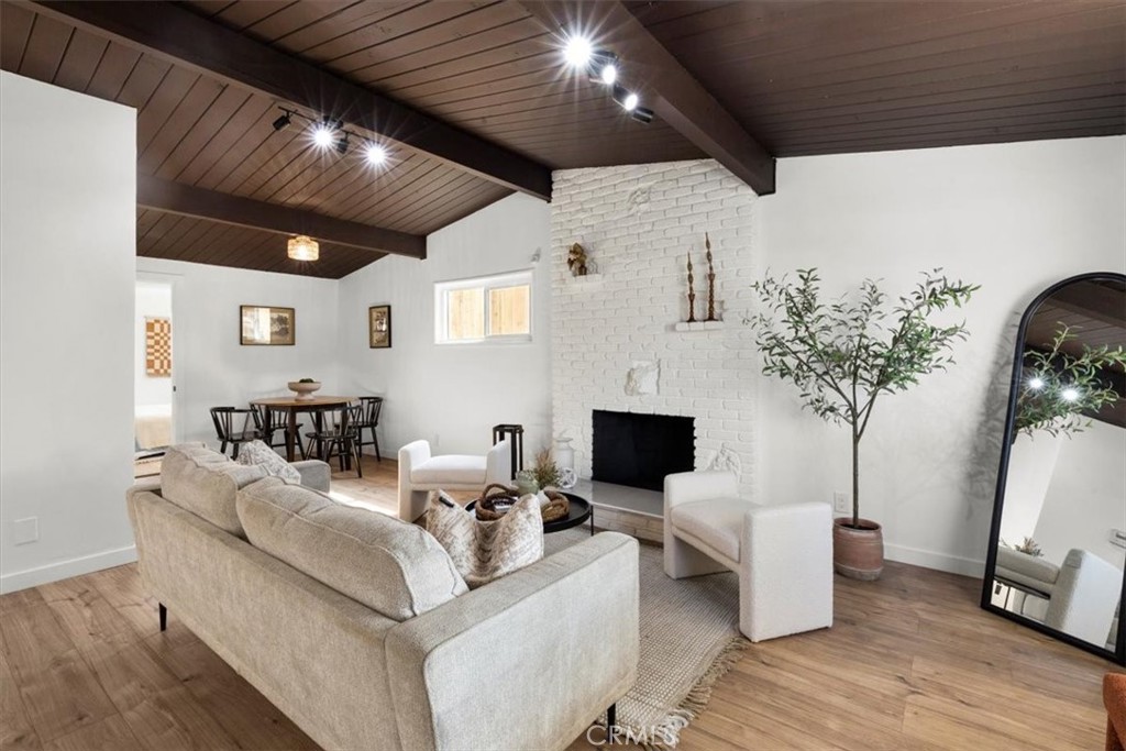 Welcome to your NEWLY REMODELED 5-bedroom, 2-bath home in the city of La Puente—Bordering West Covina! This is THE LOWEST PRICED 5 Bedroom home in the Entire City! This beautifully kept property features stunning cathedral ceilings with exposed wood beams, a chef’s kitchen with stainless steel appliances and custom cabinetry, and designer bathrooms with modern finishes. Enjoy comfort year-round with central HVAC, energy-efficient windows, and a Pristine Roof. Features beautiful flooring, Fresh interior & exterior paint, New Wood Fence, modern electrical panel, & so much more. Don't miss the opportunity to own a beautifully remodeled, worry-free home where all the hard work has been done for you. Just Move in & Enjoy! The spacious layout includes a large backyard perfect for entertaining, while the home’s location bordering West Covina offers convenient access to shopping, dining, and freeways. Move-in ready and stylishly finished, this is unbeatable value in a prime location.
