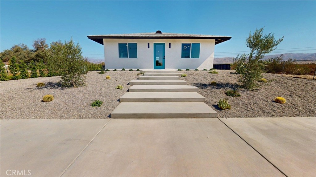 Welcome to your new upgrade home in the serene district of Desert Hot Springs, CA. This charming property features a cozy atmosphere combined with modern living, making it the perfect retreat. Fully renovated in 2025.
The key features of this well-designed home include a modern kitchen equipped with a spacious island and sleek black and white granite countertops, complemented by stainless steel appliances. The open-concept living area is bright and inviting, with multiple windows letting in plenty of natural light. Each bedroom provides a comfortable space for family plus bonus guest room and the bathrooms have been thoughtfully updated, with one featuring a bathtub and separate shower. Outside, enjoy the privacy of a fenced yard, a large gravel space, and beautifully landscaped areas. Ample parking is available on the concrete driveway.