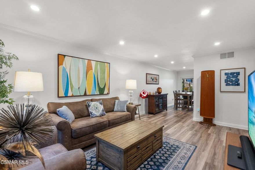 Welcome to this beautifully updated 3 bed, 2 bath townhome in the heart of Agoura Hills! This inviting home features an open floor plan with newer wood-like flooring, recessed lighting, and a bright, airy layout. The remodeled kitchen boasts granite countertops, gray cabinetry, and stainless steel appliances, flowing seamlessly into the dining and living areas. Upstairs offers three bedrooms and an upgraded bath with dual vanities and modern finishes. Enjoy your large private patio surrounded by lush greenery--perfect for relaxing or entertaining.  For added convenience, the home also features a dedicated laundry closet, dual pane windows, and central A/C. Enjoy direct access to the shared two-car garage, where you are allocated one designated parking space, along with an additional outdoor parking permit--providing convenience for daily routines and ample storage options. Conveniently located close to shopping, schools, hiking/biking trails, parks, and fwy access.  HOA pays for water and trash. This turnkey home has it all!