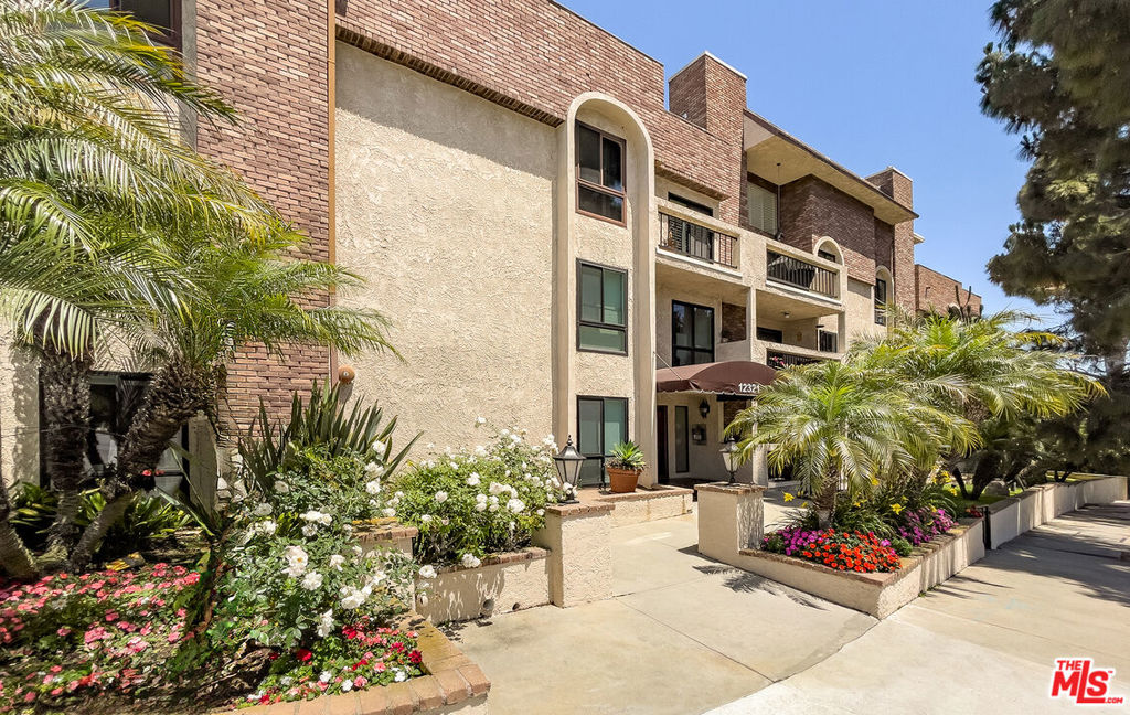 Remodeled Penthouse with Rooftop Deck, Balcony & Side-by-Side Parking. This top-floor corner penthouse offers the best of Westside living, just minutes from the beach where West LA meets Santa Monica. With soaring ceilings, expansive windows, and natural light pouring in all day, this 2BD+Loft, 2BA home feels open, bright, and inviting.The residence has been fully remodeled, featuring a sleek modern kitchen, brand-new carpet, fresh finishes, and beautifully updated bathrooms. A spacious loft provides flexibility as a third bedroom, office, or creative space, and opens to its own private patio.Outdoor living is a true highlight, with both a balcony off the living room and a private rooftop deck perfect for entertaining, dining al fresco, or simply unwinding under the open sky.Additional features include in-unit laundry, ample storage, and one of the very few side-by-side parking spaces in the building a rare convenience. Quietly positioned within the community, Unit 14 combines privacy, abundant natural light, and a move-in-ready design in one of the most desirable Westside locations.See private remarks for showing instructions.