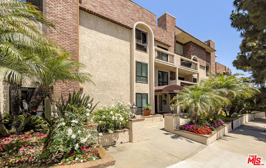 Remodeled Penthouse with Rooftop Deck, Balcony & Side-by-Side Parking. This top-floor corner penthouse offers the best of Westside living, just minutes from the beach where West LA meets Santa Monica. With soaring ceilings, expansive windows, and natural light pouring in all day, this 2BD+Loft, 2BA home feels open, bright, and inviting.The residence has been fully remodeled, featuring a sleek modern kitchen, brand-new carpet, fresh finishes, and beautifully updated bathrooms. A spacious loft provides flexibility as a third bedroom, office, or creative space, and opens to its own private patio.Outdoor living is a true highlight, with both a balcony off the living room and a private rooftop deck  perfect for entertaining, dining al fresco, or simply unwinding under the open sky.Additional features include in-unit laundry, ample storage, and one of the very few side-by-side parking spaces in the building  a rare convenience. Quietly positioned within the community, Unit 14 combines privacy, abundant natural light, and a move-in-ready design in one of the most desirable Westside locations.See private remarks for showing instructions.