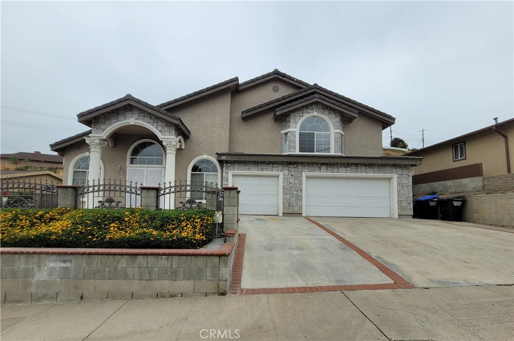 *Turn-key 2-story house open floor plan built in 1957 and remodeled in 1995. *Total living area 3,214 sqft. *Large lot size 8,642 sqft. *Spacious and bright living room with high ceiling, cozy fireplace and wet bar. *Oversized eating area. *Gourmet kitchen offers granite countertop, kitchen appliances, pantry and lots of cabinets. *Luxurious master suite with Jacuzzi tub, 2nd suite, 3rd bedroom, 3rd full bathroom and large den all upstairs. *4th bedroom and 4th full bathroom downstairs. *Tile floor in all 4 bathrooms, eating area, kitchen and downstairs bedroom. *Wall-to-wall carpeting in living room, staircase, upstairs 3 bedrooms, den and hallway. *Dual-zone HVAC and house-wide alarm system. *3-car attached garage with remote controlled garage door opener also offers other doors direct access to living room, kitchen and side yard. *Additional 3 more parking spaces on private driveway outside the garage. *Laundry hooks-up, central vacuum system and plenty of built-in storage spaces inside garage. *Block walls surrounding side yards and back yard. *Peaceful and quiet neighborhood with sidewalk for jogging. *Excellent Brightwood elementary school. *Panoramic city view. *Easy access to shopping plaza, restaurants, East LA college, church, downtown LA and Fwy-10, 60, 710. *Property sold in as is present condition.