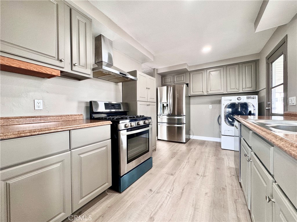 Seller Financing Available! Fully Remodeled turnkey 3B/2B Home in 55+ Community, conveniently located near shopping, dining, and everyday essentials. This home welcomes you with a spacious open floor plan, fresh new paint & vinyl flooring throughout. The beautifully updated kitchen boasts modern cabinetry, granite countertops, and stainless steel appliances, with a refrigerator, washer, and dryer included for added convenience. Each bedroom offers an extra-large closet, providing ample storage for everyone. This home features a spacious sunroom-style porch, a perfect spot to enjoy your morning coffee, relax with a good book or spend time with friends and family. The community is complete with a wide range of amenities including a heated pool, indoor jacuzzi, micro gym, BBQ area, Billiard room, and a large clubhouse. Schedule a tour today and experience the comfort and peaceful lifestyle this home has to offer!