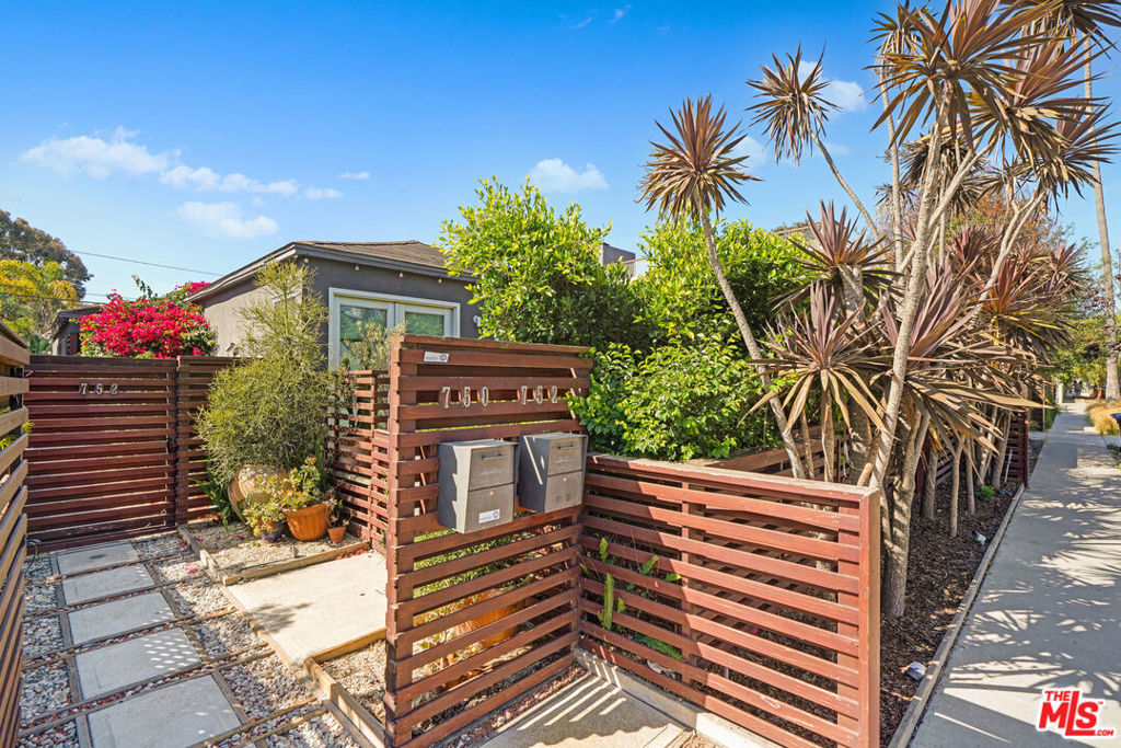 A unique opportunity to own two classic Venice Beach bungalows (2BD/1BA & 1BD/1BA) on a generous lot with abundant outdoor space, parking, and a private spa with an outdoor shower. Ideal for an owner-user seeking rental income or a smart investor in one of the world's most iconic coastal neighborhoods. Located just minutes from the heart of Venice, this private duplex blends coastal charm with modern convenience. The front unit (2BD/1BA) features a welcoming private patio, perfect for morning coffee or evening cocktails. Inside, natural light fills the open-plan living and dining areas, flowing seamlessly into a spacious kitchen outfitted with ample cabinetry, a chef's island, and hardwood floors throughout. Two well-sized bedrooms share an updated bathroom. A separate laundry room leads to a second outdoor patio with dedicated storage for bikes, surfboards, and more. The rear unit (1BD/1BA) offers its own private entrance and a spacious, secluded outdoor area complete with a spa and outdoor shower. High ceilings and skylights enhance the bright living space, while the open kitchen includes stainless steel appliances, a chef's island, and breakfast bar. The large bedroom connects to a walk-in closet with laundry facilities. Additional highlights include a detached two-car garage offering exciting ADU or development potential. All of this just blocks from Lincoln Blvd, Rose Ave, Abbot Kinney, and Venice Beach. A rare blend of lifestyle, location, and flexibility, this is Venice living at its best.