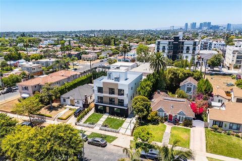 Photo of 1557 S Ogden Dr, Los Angeles, CA 90019 (MLS # BB25282266)