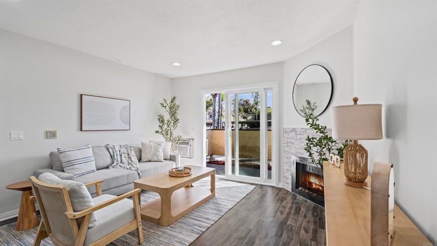 Step into this modern 1-bed/1-bath condo in Mission Park, offering a bright, open and airy floorplan designed for effortless living. The stylish kitchen features stainless steel appliances, shaker cabinetry, subway tile backsplash, and quartz countertops, flowing seamlessly into a comfortable living room highlighted by a stack-stone fireplace. A private patio extends the living space outdoors—perfect for morning coffee or relaxing evenings. Enjoy the convenience of an in-unit full-size washer and dryer, plus a designated parking space. Mission Park amenities include pools, spa, fitness room, tennis courts and beautifully maintained park areas. Ideally located just minutes from Hollandia Park and local schools, close to Cal State San Marcos, and offering easy access to the 78 freeway, this condo pairs modern comforts with everyday convenience. Perfect for a first-time buyer, downsizer, or investor seeking a well-appointed home in a prime San Marcos location.