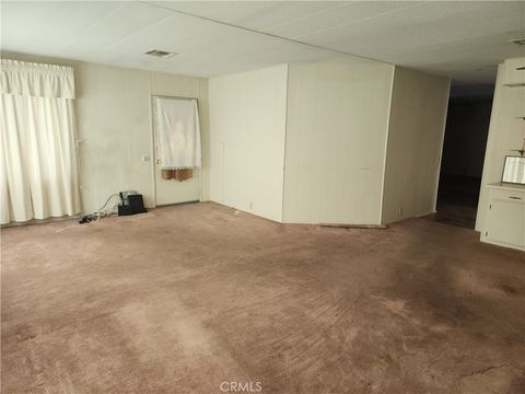 Photo of 13393 Mariposa Rd #181, Victorville, CA 92395 (MLS # HD26029009)