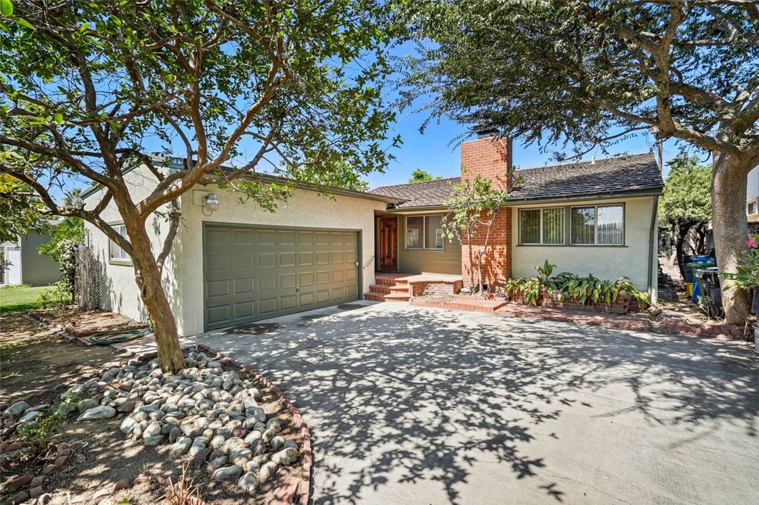 Xlnt Value! Legacy home comes on the market for the first time since bought by the original owner! Lovingly maintained, thoughtfully expanded and tastefully upgraded, this home exudes character and charm. Beautiful hardwood floors in many rooms; corner fireplace and mantel in the living room, the renovated kitchen features high-quality appliances, the family room enjoys great natural light, the bedrooms are very spacious and have generous closet space, the master bathroom includes a bidet. The back and front yards are full of luxuriant vegetation and productive fruit trees, including figs, guavas and apples. The back patio offers great privacy, seclusion and peace, and is highlighted by a sparkling swimming pool. The garage has been improved with convenient storage shelving and cabinets, and a workshop area has also been added.