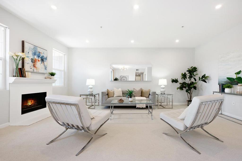 HOA fees reduced by $100.00! Great opportunity for home or investment (HOA allows rentals). Own a top-floor 2-bedroom, 2-bath condo in one of Burlingame's most desirable neighborhoods. This 1,154 sq ft home has natural light and showcases tasteful, modern updates throughout. An open-concept layout seamlessly connects the spacious living and dining areas, featuring recessed lighting, a cozy gas fireplace, and direct access to a private balcony, perfect for relaxing or entertaining. Fresh paint and plush new carpet add to the move-in-ready appeal. The updated kitchen features new countertops, stainless steel appliances, new flooring, and refinished cabinets. The primary suite includes an en-suite bath with dual sinks and a shower/tub combo. The second bedroom is by a full hall bath, making it perfect for guests, family or a home office. Both bathrooms have been updated with contemporary finishes, creating a fresh and inviting atmosphere. Additional conveniences include in-unit laundry, a secure building with elevator access, a dedicated garage parking space with extra storage, and rare ample guest parking for a building of this size. HOA dues of $548/month cover access to a shared backyard, well-maintained common areas, water, garbage services, and exterior maintenance.
