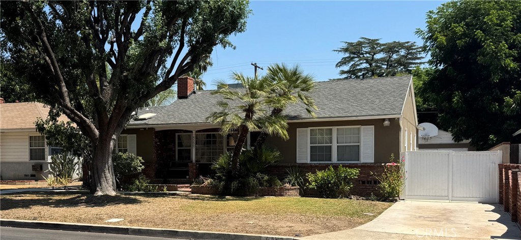LOCATED IN MIDVALE ESTATES. Investors and those looking to own a property with enormous income potential, look no further! Live in the front home and create a couple of rental units on site with minimal modifications. Many meticulous upgrades and additions that could easily be converted to make this home into a 3 or 4-unit investor's dream. Starting from the gleaming true hardwood floors that extend from the entry to the living room and throughout the formal dining room, to the large kitchen with stainless steel appliances, breakfast area, and granite countertops. Separate room, currently used as an office, 3 Bedrooms, and 2 bathrooms on the right side of the property. Smooth ceilings, wainscoting, crown mouldings, and tall baseboards are just a few of the upgrades this home has to offer. A large skylight in the dining room adds brightness and sunlight to the home. Towards the back, there is an extensive bonus room with beamed ceilings, a fireplace, a half bath, and a separate entrance, which makes this the perfect future accessory unit. The backyard has a covered patio, built-in grill, large rectangular pool, detached triple (tandem) car garage with a very long gated driveway, creating another opportunity for an easy conversion to a future ADU. The location of this home offers the unique opportunity for extensive street parking since there are no homes across the street. This offers a wonderful option for future owners to accommodate parking. The property has copper plumbing as well.