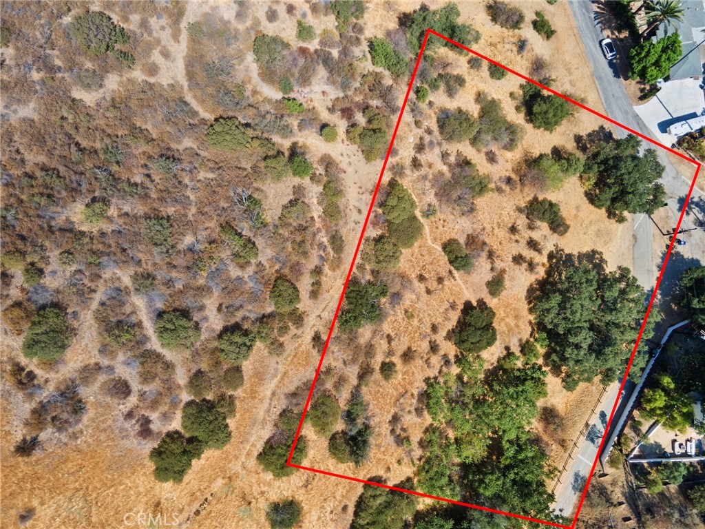 Over an acre of buildable land in coveted Shadow Hills. Multi-million dollar homes have been built nearby. This vacant lot is at the end of a cul-de-sac on a small street off Sunland Ave, offering ultimate privacy to the end user. Horse trails, Big Tujunga Creek, Hansen Dam Horse Park and Orcas Park are all nearby, as are the 210 Freeway, Angeles National Golf Club, shopping and highly rated schools. Public utility hookup is available. Zoned LARE40. Don't miss this opportunity to build a dream home on this spacious lot. Survey available with four corners already marked. Buyer to verify buildability and accessibility of utilities. Seller financing possible with down payment.