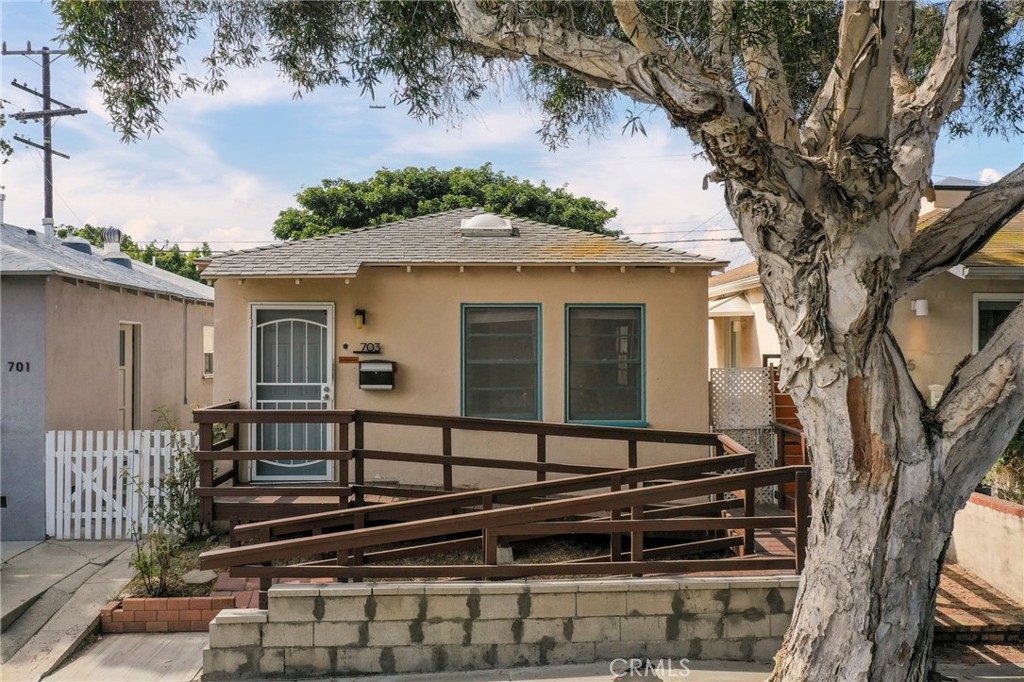 WELCOME TO 703 Ozone St., a prime REMODELING AND FIXER-UPPER opportunity in the coveted Ocean Park neighborhood. This two-bedroom, one-bathroom cottage style house offers a unique chance to own in Santa Monica and bring your vision to life. Situated on a normal lot size for the area, the property includes an attached one-car garage and a small, but charming outdoor area in the backyard. The area's zoning allows for numerous options to create your dream home or vacation getaway. The property is located on a quiet, tree-lined street directly opposite the historic Ozone Park, established by the City of Santa Monica in 1916. This fantastic location is just seven blocks from the beach and minutes away from Venice, Marina Del Rey, Santa Monica's 3rd Street Promenade, and the Santa Monica Pier. Enjoy easy access to world-class restaurants, cafes, and shopping, experiencing Santa Monica at its best.