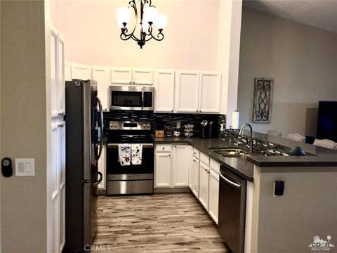 Photo of 41120 Woodhaven Drive, Palm Desert, CA 92211 (MLS # 218006676DA)