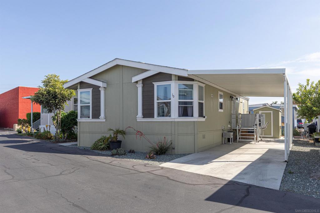 Affordable Comfort at 1148 3rd St #10 Enjoy the perfect blend of value and convenience in this inviting 3 bedroom, 2 bath, manufactured home. This 55+ community is super desirable. Designed with comfort and accessibility in mind, this residence offers easy living in a desirable location close to shopping, dining, and everyday essentials. Features You’ll Love: Open floor plan Kitchen with center island Bright, open living space with private patio/balcony Wheelchair lift for easy access Walk-in shower in one bathroom Walk in Spa tub/shower in other bathroom Functional kitchen with ample storage Secure entry, assigned parking, and well-kept community spaces Access to community clubhouse A Smart Move Perfect for first-time buyers, downsizers, or anyone seeking an affordable, accessible home with thoughtful upgrades and a prime location. Call to view.