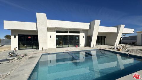 Photo of 60277 Pueblo Trail, Joshua Tree, CA 92252 (MLS # 25628881)