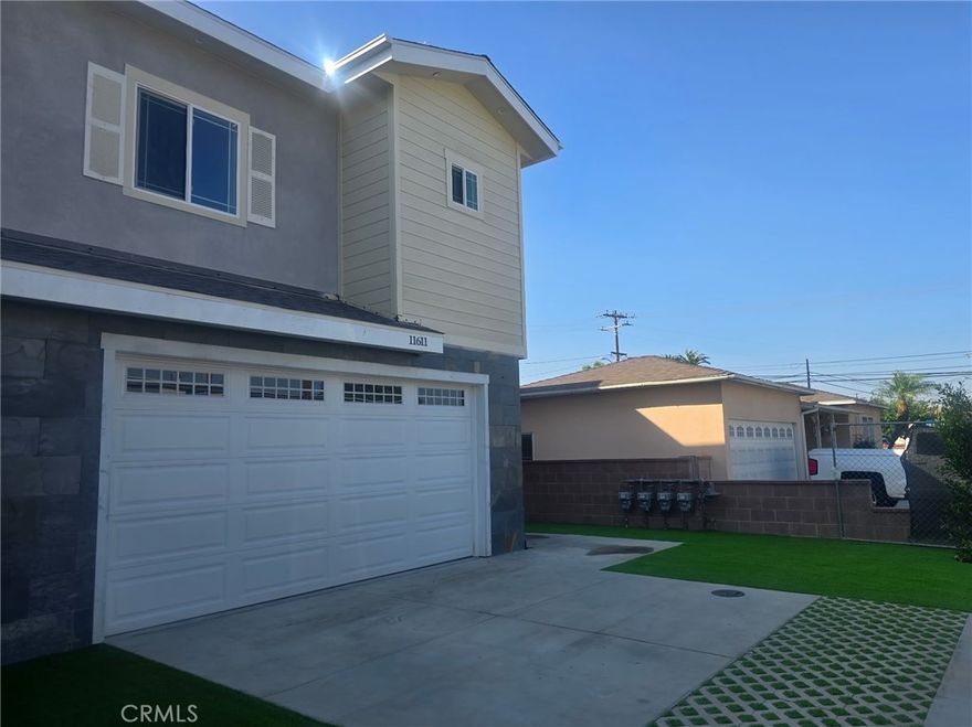 Spacious 5 bedroom 3 bath home 1 bedroom down stairs 4 bedrooms upstairs 2 car attached garage. one common wall with the next door unit 

 there are 3 other houses in the lot