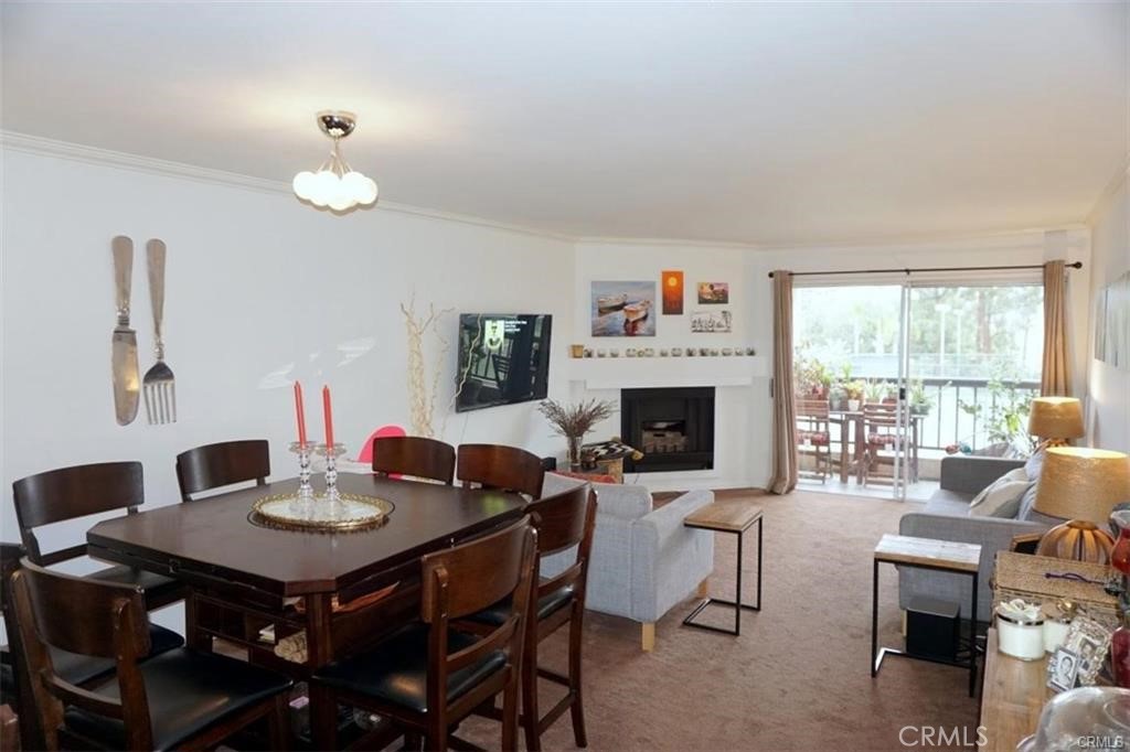 Welcome to this 2 bedroom, 2 bath condo located on the second floor of Building 7 at The Met with a tenant already in place! Perfect unit for an investor!!! This unit is positioned away from the freeway, facing the tennis court with no neighboring units looking in, featuring in-unit washer and dryer, fireplace, and a spacious balcony with views of mature trees and tennis courts, includes two covered tandem parking spaces in the underground garage, part of a guard-gated resort-style complex offering six lighted tennis courts, four swimming pools, a fully equipped fitness center, indoor basketball and racquetball courts, children’s play area, 24-hour security, pet-friendly environment, all just minutes from restaurants, bars, shopping centers, and the all-new Village at Warner Center, ideal for investors looking for immediate rental income in a high-demand Woodland Hills location.