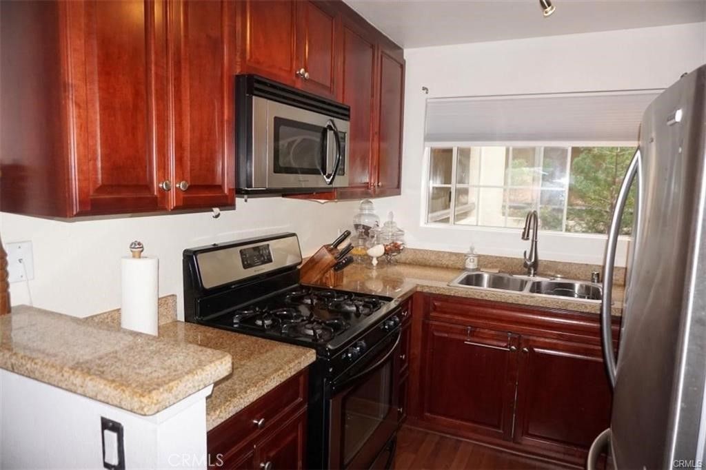 Photo of 5520 Owensmouth Avenue #217, Woodland Hills, CA 91367 (MLS # SR25159890)