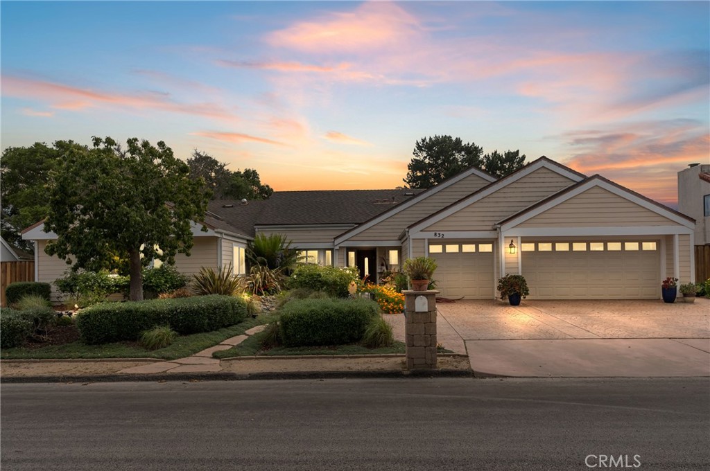 Single-Story Elegance in Coveted Mesa Oaks. Welcome to this rare 6-bedroom, 4-bathroom gem in the sought-after Mesa Oaks neighborhood. Spanning over 3,000 sq. ft. on a beautifully landscaped 0.3-acre lot, this exceptional single-story home offers flexible living options ideal for anyone seeking abundant space and comfort. Inside, two primary suites provide ultimate flexibility—one designed to be a potentially separate living area with sliding doors to the exterior, dedicated A/C, as well as a fireplace with custom marble surround and mantle. Four bedrooms include generously sized walk-in closets lit by skylights. The spacious living room features a cozy fireplace, wet bar, and dual oversized sliding glass doors that open seamlessly to the backyard deck, perfect for entertaining or relaxing. The kitchen is both functional and charming, offering ample cabinetry including a pantry, elegant marble countertops, built-in dual ovens, and a touch-less faucet—all with serene garden views from the window. There are heavy ceramic decorative floor tiles and medium varnish red oak trim throughout the home. Step outside into a backyard oasis—meticulously maintained with a majestic oak tree, vibrant flowers, fruit trees including two apple varieties, an avocado tree, citrus trees, a three varietal tree that has apricot, plum and peaches, complemented by a wooden deck and meandering paths. The exterior is equipped with lighting as well as stainless steel gopher guard under the front yard landscaping and rear lawn to help keep everything looking pristine! To add to the ambiance are nearby trails, further connecting you to nature. Additional highlights include a space for potential RV parking, a three-car garage with 220 volt EV charger, 4- car stamped concrete driveway, dual water heaters, a newer roof installed in 2019, seamless aluminum gutters and fully paid-off solar installed in December 2019. The home also features thoughtful ADA-friendly touches, including a zero-threshold shower in one of the primary suites. Located near Vandenberg Space Force Base, renowned local wineries, beloved eateries, and stunning Central Coast beaches, this home offers the perfect blend of peaceful living and everyday convenience.