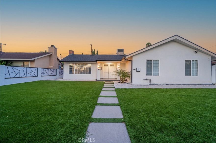 Completely remodeled single-family home with a fully permitted attached ADU in prime Granada Hills! This turnkey property features an open-concept main home with modern finishes, including new flooring, recessed lighting, a designer kitchen with quartz countertops and stainless steel appliances, and updated bathrooms with sleek fixtures. Enjoy summer in the private backyard with a sparkling pool and built-in BBQ area—perfect for entertaining. The attached ADU has a separate entrance, its own kitchen, bathroom, and living space, ideal for rental income, extended family, or a home office. Located on a quiet street near schools, shopping, dining, and freeway access, this versatile property is a must-see!