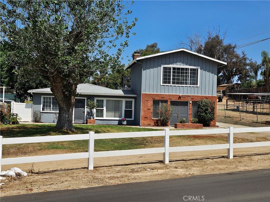 A rare opportunity to grab up nearly an acre of flat, usable horse property in Norco!   PLEASE TAKE THE TIME TO WATCH THE VIDEO TOUR!



This wonderful family home offers a perfect blend of comfort and style, featuring modern amenities and spacious living.

Newly updated throughout, with vinyl plank flooring extending throughout the downstairs living areas, creating a seamless and inviting atmosphere. Natural light floods the space, and the bright and airy living room opens into an expansive bonus room with separate double door entry - ideal for entertaining. The heart of the home is the stunning, renovated kitchen, with crisp white shaker cabinets, sleek quartz countertops, and modern appliances ready for your culinary adventures. Both bathrooms have been tastefully updated, and there are lots of built in storage spaces.

The generous lot (just shy of an acre) offers a mix of landscaped areas and wide-open space for future development. The storage shed has power and a separate water heater for your washer and dryer, and there is an RV pad nearby, complete with hookups and ample access from the street. 

The sky’s the limit when you have this much land to work with; ADU, stables, pool - make your own dreams come true!