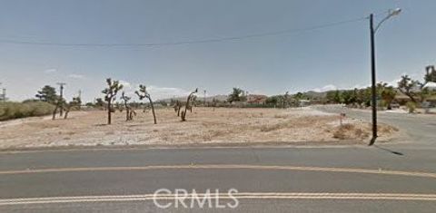 Photo of 7349 Joshua Lane, Yucca Valley, CA 92284 (MLS # RS26085070)