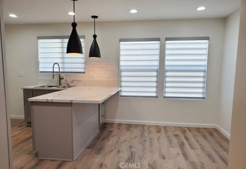 Photo of 1338 1/2 S Cochran Avenue, Los Angeles, CA 90019 (MLS # PW26189883)
