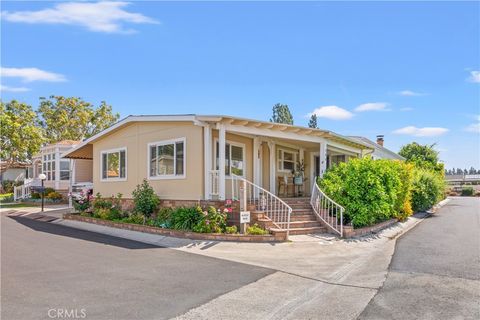 Photo of 5200 Irvine Blvd. Spc 194 Blvd, Irvine, CA 92620 (MLS # PW26068139)