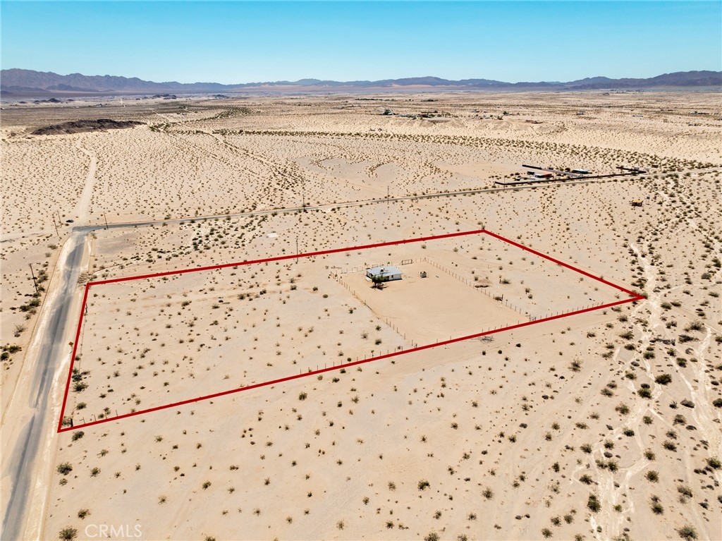 Escape to your private desert oasis beneath wide-open skies filled with endless potential. Don’t miss this super affordable opportunity to own a 2-bedroom, 1-bath single-family home, built in 1952, nestled on 5 spectacular view acres in the iconic Wonder Valley area of 29 Palms. With 1,050 sq ft of gross living area, this fixer offers the perfect opportunity for a full rehab and creative transformation.
Whether you're dreaming of a desert getaway, a minimalist retreat, or an off-grid artist’s studio, this property offers a rare chance to bring your vision to life. The land is ideal for expanding into a desert ranch, and the home has great potential as an AIRBNB. Remodeled AIRBNBs in the area are listed for $200K to $400K, making this a promising investment for short-term rentals.
Although it feels remote, you're just 10 minutes from key local spots including Luckie Park, community pools, 29 Palms Junior High School, and Tom Nicoll Memorial Stadium. You’ll also enjoy easy access to Downtown 29 Palms, Joshua Tree National Park, the USMC Base, and Mojave Trails National Monument.
If you’re a visionary, this property is your chance to create something truly special.