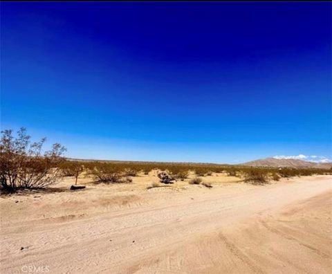 Photo of 0 Dennis Avenue, Joshua Tree, CA 92252 (MLS # CV25180736) Photo of 0 Dennis Avenue, Joshua Tree, CA 92252 (MLS # CV25180736)