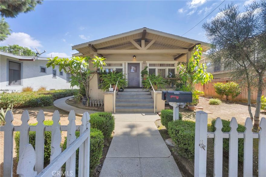 Two distinct single-family homes on one 7,000± SF lot. The front house (California Craftsman, c.1910) is 1,427 SF, 3BD/2BA, and has been fully restored—original refinished hardwood floors, professionally preserved original windows, crown molding, masonry fireplace, and built-ins in the dining & living rooms—balanced by renovated kitchen & baths, stainless steel appliances, updated plumbing & electrical, and central AC & heat. Large covered patio with Trex flooring, lighting, and access to the park-like backyard. The rear home (custom-built 2010) is 1,015 SF, 2BD/2BA, also with central AC & heat. Recently replaced roofs on both structures. Separate addresses & separate utility meters. In-unit laundry. Parking: (one) 2-car garage + (two) 1-car garages + (three) driveway spaces. Lush landscaping with mature avocado & citrus. Sought-after early-20th-century charm near Uptown Whittier and Whittier College. Zoned R-4. 2010 construction fully permitted - blueprints available. May be purchased with 7602–7604 and 7606-7608 Pickering, as a rare side-by-side portfolio offering.