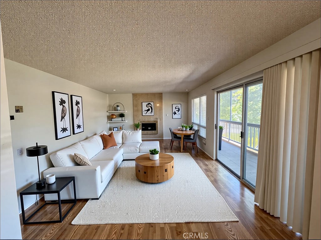 Welcome to this charming 2-bedroom, 2-bath condo nestled in the heart of the highly sought-after Laguna Woods Village—one of the most recreation-rich 55+ communities in the country. This 1,123 sq ft corner unit is ideally positioned with no one below and conveniently located above the carport, offering added privacy and ease of access. Step inside to find a light and bright interior, featuring a fresh white kitchen that opens into the spacious living area. The enclosed balcony provides a peaceful retreat for enjoying morning coffee, reading, or simply soaking in the sunshine. Residents of Laguna Woods Village enjoy resort-style amenities designed to invigorate the body, mind, and spirit, including two professional golf courses, 10 tennis courts, seven pickleball courts, five pools, four hot pools, three fitness centers, an equestrian center, and more than 200 clubs and social groups to join. Don’t miss your opportunity to live in this vibrant, active community—where every day can feel like a vacation!
