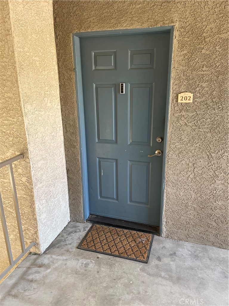 Desirable Triana Condominium in Corona Ranch Community. This Condominium features 2 bedrooms, 2 full Bathrooms, Idoor Laundry area with full size washer Dryer. Central heat and AC. Kitchen with Breakfast Bar, Granite counter tops, includes, Stove, Microwave, Dishwasher, and Refrigerator. This Unit has a one garage garage included in rent. Common Pool, Spas, Clubhouse, Gym. Owner pays the HOA Dues which covers water and trash fees. Great Schools! Great Location close to Costco, restaurants, UFC Gym, in between McKinley/91 and Hidden Valley/15 fwy.